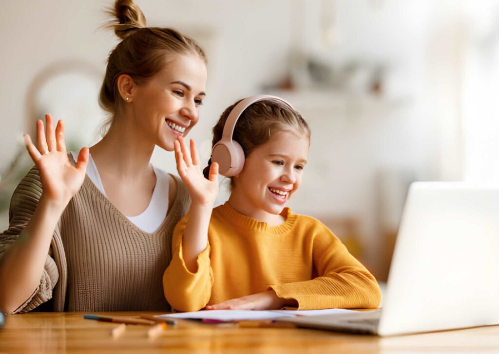 A young mother supporting her daughter during an online learning session, representing professional parent coaching services.